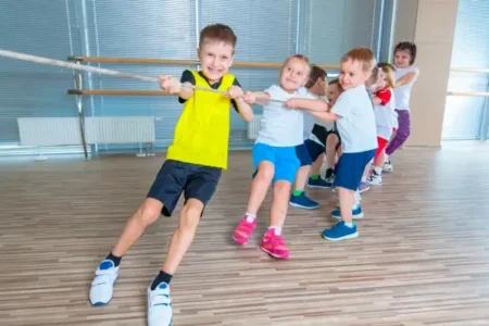 games A group of kids playing tug of war